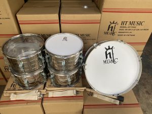 Vận Chuyển Trống Trường, Trống Đội – An Giang Logistics: Thân Gỗ Vững Chãi, Tiếng Vang Rộn Rã